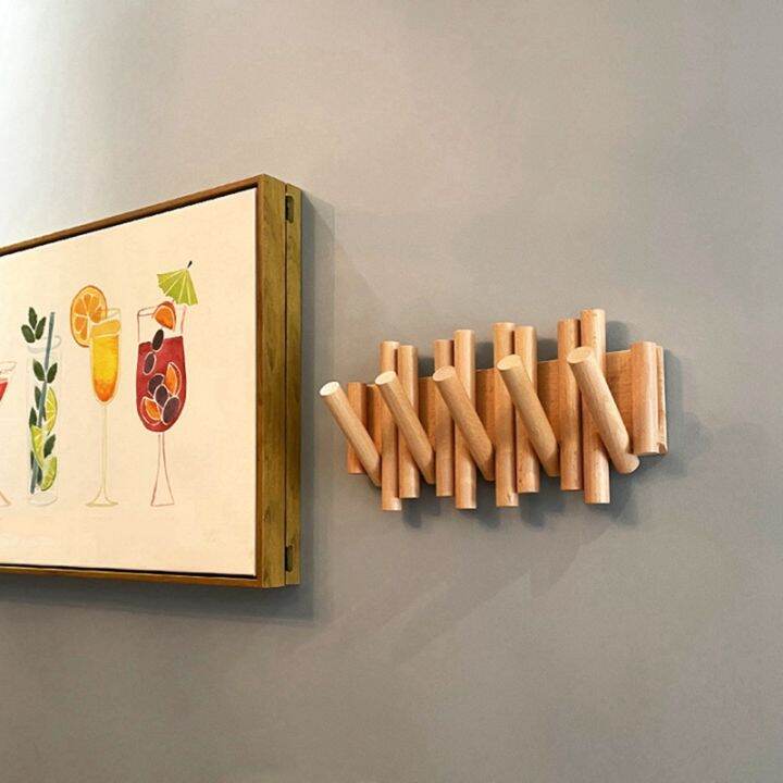 wall-mounted-rack-with-folding-hooks-modern-wooden-rack-perfect-to-hang-coats-umbrellas-towels-and-aprons