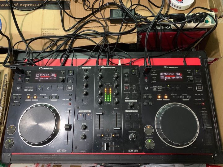 Pioneer CDJ350 disc player, pioneer of secondhand DJ equipment, a pair of mixing tables