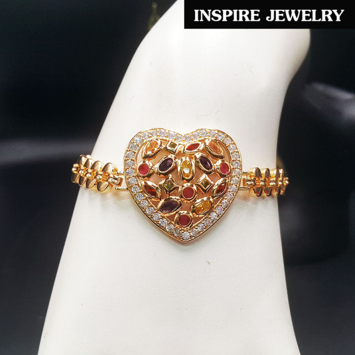 inspire-jewelry-สร้อยข้อมือกึ่งกำไล-ฝังพลอยนพเก้า-และล้อมด้วยฝังเพชรสวิส-สวยงามมาก-งานแฟชั่นชั้นนำ