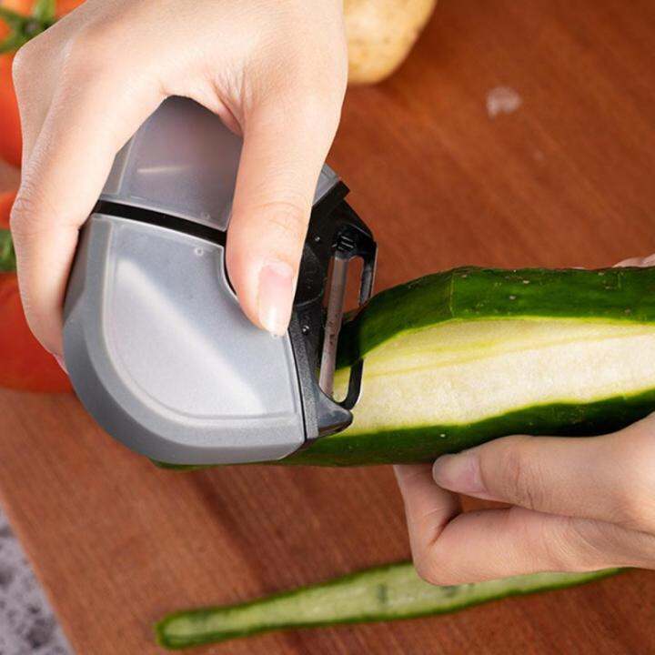 accessories-curved-hand-slices-multifunctional-three-in-one-peeler