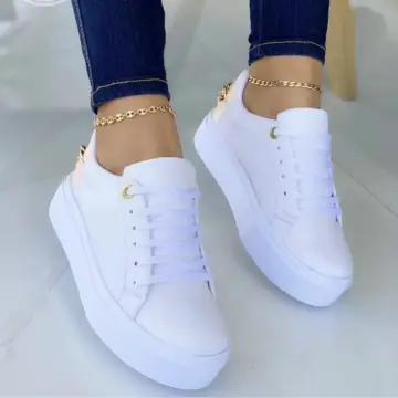 White platform store sneakers designer