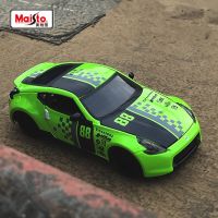 Maisto 1:24 2009 Nissan โมเดลรถยนต์สปอร์ตโลหะเหล็กหล่อแบบจำลองรถแข่งโลหะแบบจำลองของสะสมของขวัญของเล่นสำหรับเด็ก