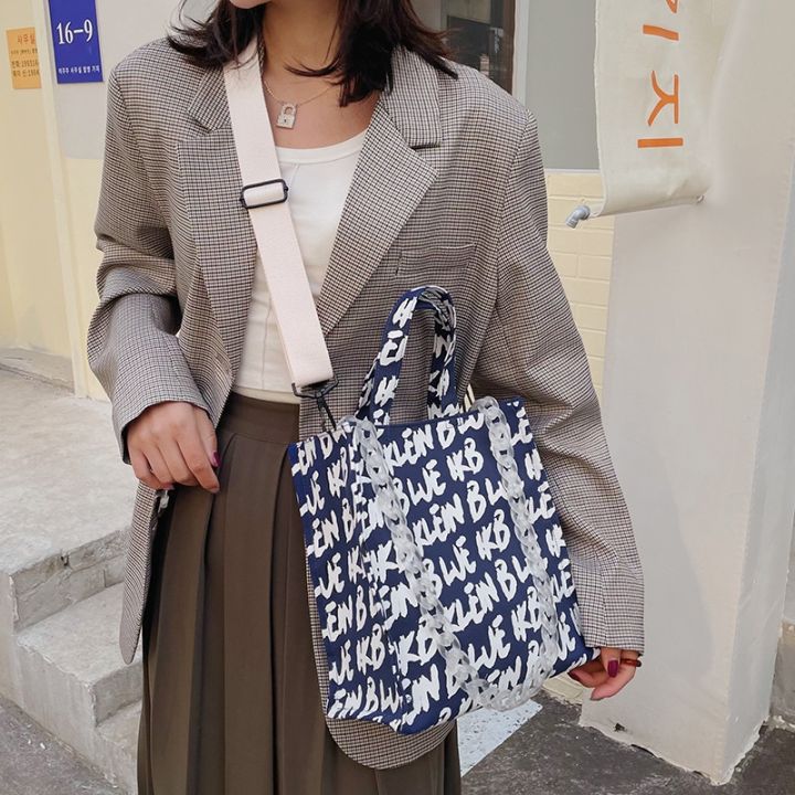 cross-border-new-klein-blue-one-shoulder-his-canvas-bag-female-western-style-letters-printing-large-capacity-hand-held-tote-bags