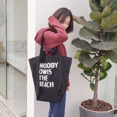 bangkokshop(B1783) กระเป๋าผ้าใบใหญ่ NOBODY OWNS THE BEACH ผ้าแคนวาสมี4สาย