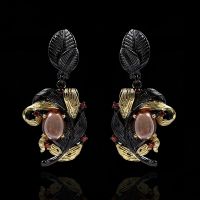 [COD] wish hot new exaggerated black gold two-color earrings and creative flower texture