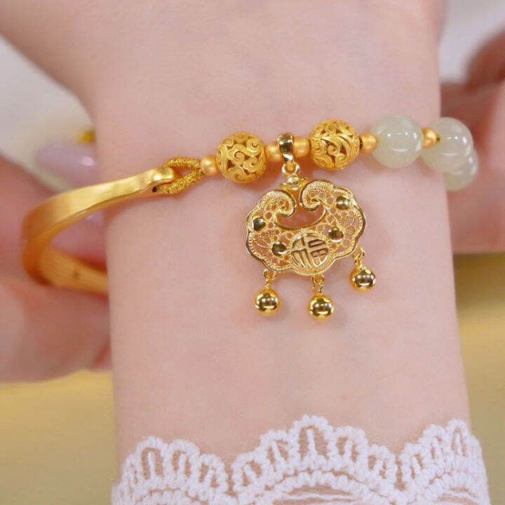 Gold bracelet with on sale lock