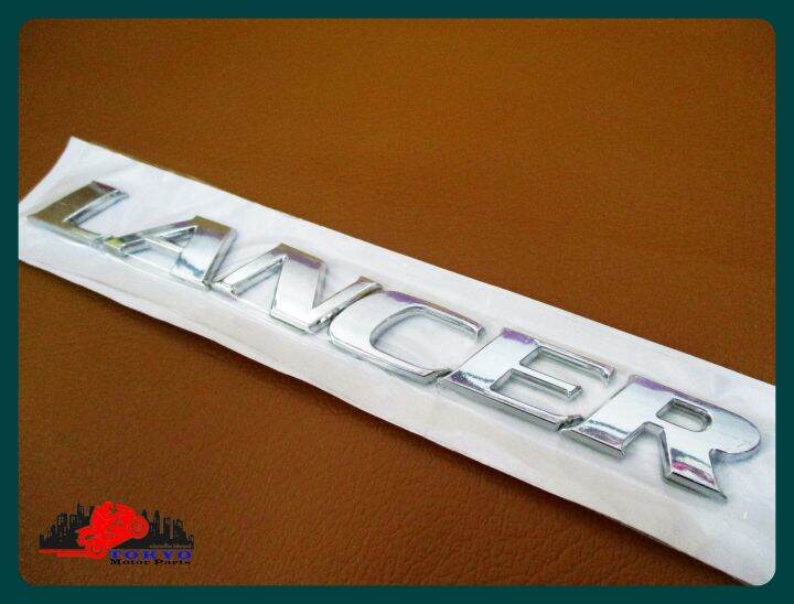 mitsubishi-logo-lancer-plate-sticker-chrome-size-18x2-cm-1-set-โลโก้-lancer-ติด-mitsubishi-ขนาด-18x2-ซม-พร้อมกาวติด