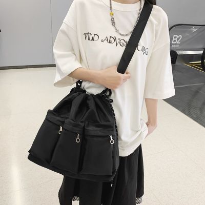 Ins Trendy Brand Crossbody Bag Mens Niche Design Drawstring Shoulder Bag Womens Sports Riding Black Tooling Bag 2023