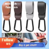 ALDRICH FASHION 1/2pcs คุณภาพสูง หมุนได้ 360 องศา อเนกประสงค์ หนัง PU อุปกรณ์เสริมสำหรับรถเข็นเด็ก รถเข็นเด็ก ตะขอเกี่ยวรถเข็น ตะขอแขวน