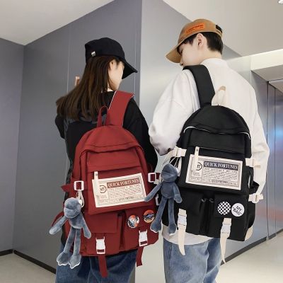 กระเป๋าเป้สะพายหลังนักเรียนรุ่นเกาหลี Trend Letter โรงเรียนมัธยมศึกษากระเป๋าเป้สะพายหลังความจุขนาดใหญ่สำหรับคู่รัก UCOR