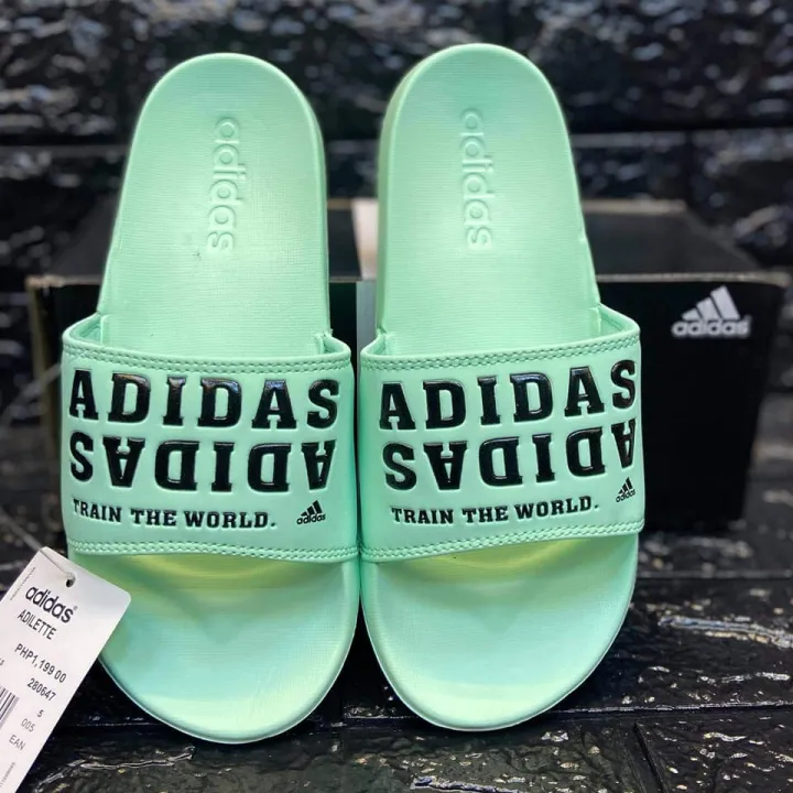 adidas train the world slides price