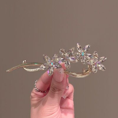 Korean version of fashion inlaid diamond flower hairpin crystal twist clip disc hairpin a word clip exquisite hair accessories