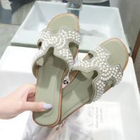 ✟✐☒Slippers women 2021 summer new fashion outer wear flat pearl one-word drag wild net red beach shoes