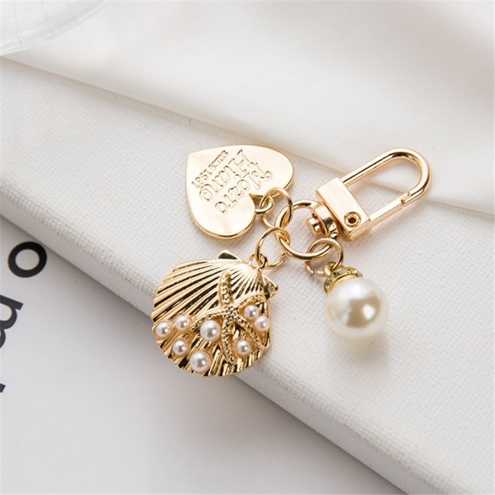 luxury-artificial-pearl-keychain-metal-peach-heart-pendant-keyring-women-fashion-headphone-case-charm-bag-jewelry-accessories