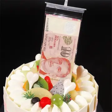 Where's the Money? Inside the Kink Cakes Money Pulling Cake - COOK MAGAZINE