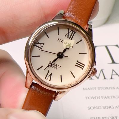 นาฬิกาควอตซ์แบบย้อนยุคสุดหรูแฟชั่นน้ำหนักเบาเรียบง่ายช่องนาฬิกาข้อมือหรูหราไฟสุภาพสตรีใหม่