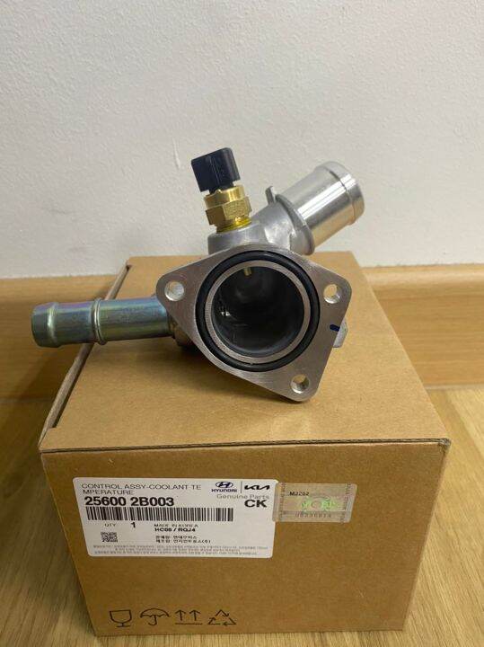 THERMOSTAT HOUSING with switch GENUINE PART (ORIGINAL) [256002B003