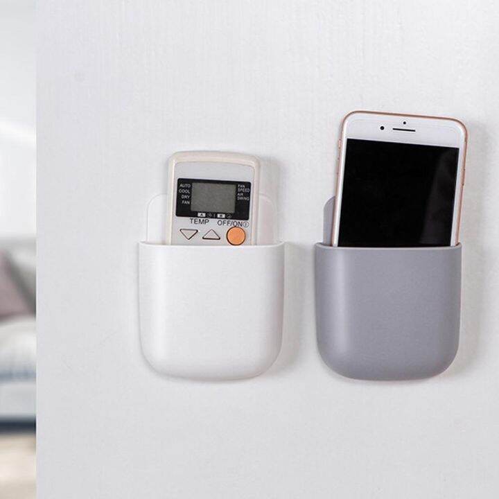 wall-mounted-organizer-storage-remote-control-air-conditioning-storage-mobile-phone-plug-holder