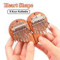 มินิรูปหัวใจ Kalimba 8คีย์นิ้วหัวแม่มือเปียโนพร้อมอุปกรณ์เสริมสำหรับผู้เริ่มต้นวัยรุ่นผู้ใหญ่สร้างสรรค์กล่องดนตรีเครื่องดนตรี