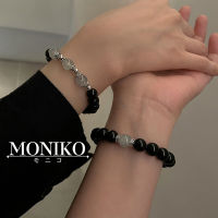 MONIKO สร้อยข้อมือแม่เหล็ก สีดํา แฟชั่นคู่รัก สําหรับผู้หญิง และผู้ชาย จํานวน 2 ชิ้น