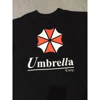 มีสินค้า เสื้อยืดผ้าฝ้ายพิมพ์ลายแฟชั่นเสื้อยืดเกมส์มือสอง UMBRELLA CORPORATION RESIDENT EVIL Size L มือ2