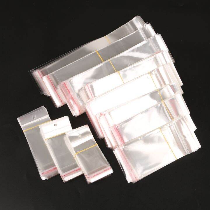 yf-100pcs-transparent-adhesive-opp-plastic-cellophane-gifts-bag-pouch-jewelry-with-hole