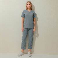 Europe and America New Style Solid Color Pocket V-neck Anti-Nursing Care Work Uniforms Nurses Uniform Two-Piece Set