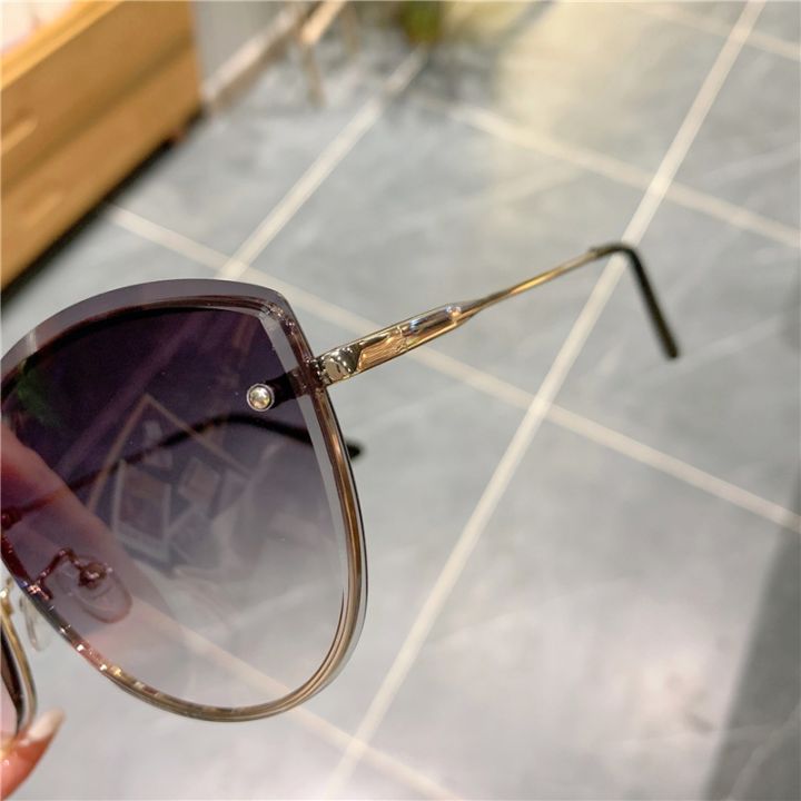 rimless-clip-oval-sun-glasses-for-women-luxury-oversized-retro-vintage-designer-women-sunglasses-car-driving-outside-shades