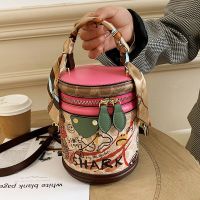 Little bear graffiti bucket bag 2023 new cylinder bag niche design handbag single shoulder Messenger womens bag small bag 〖LYUE〗