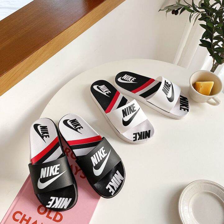 nike flat slippers