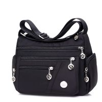 ♣ New middle-aged female bag lady nylon Oxford spinning single shoulder slope bag waterproof pocket package