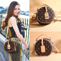 ▬◊☂ Small leather bag new female 2022 French niche design feeling mini portable round senior inclined shoulder