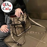 Qiacai 2023 new trendy genuine leather texture bag womens high-end niche popular cross-body bucket this year