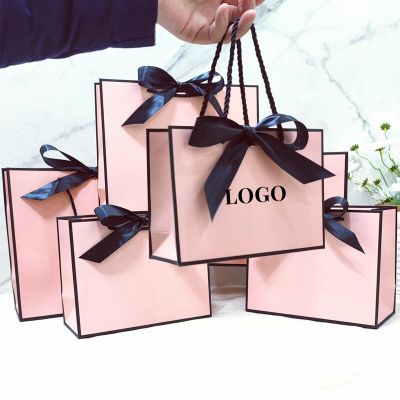 50Pcs Kraft Paper Bag Custom Logo Trademark Tote Bag With Bow Knot Packaging Bag Gift Clothing Store Shopping Wrapping Paper Bag Gift Wrapping  Bags
