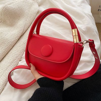 French hand bag 2021 winter new leisure small steamed bun simple pure color single shoulder worn handbag brim sense
