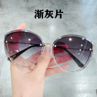 【Hot sales】 รุ่นใหม่ที่นิยมในโลกออนไลน์สไตล์เกาหลี G Home Diamond Frameless Ceshirting Sunglasses Beauty Star Street Shooting Fashion Sunglasses