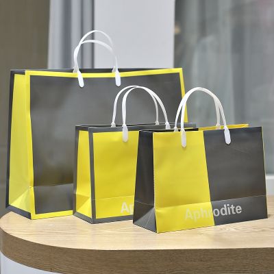 Gray and yellow color matching clothing store bags custom high-grade plastic pvc hand carry packaging womens clothing shopping handbags 【MAY】
