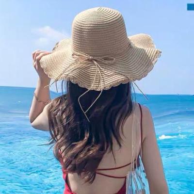 Uniqlo 2023 New beach hat womens summer beach woven sun hat new Korean style womens big flower straw hat thin section breathable sun hat UV protection
