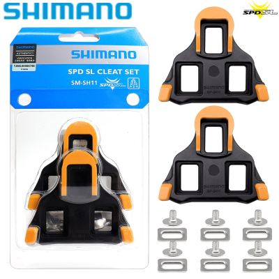 Shimano SPDSL SH12 SH10 SH11ปุ่มยึดคันเหยียบจักรยานเสือหมอบล็อคตัวเองเสาหลักแป้นเหยียบตัวหนีบจักรยานสำหรับ R550 R540 R8000ชิ้นส่วนเดิม