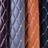 High-grade PU leather / perforated embroidered plaid fabric / car interior roof fabric / plaid car seat cushion sponge fabric