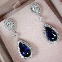 Blue and white dangling earrings