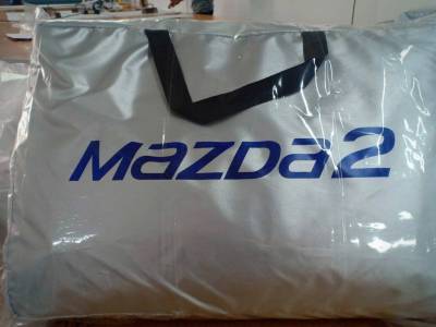 ผ้าคลุมรถซิลเวอร์โค๊ต (แบบหนา) MAZDA 2 4 D  แถมฟรี! ม่านบังแดด 1 ชิ้น