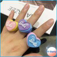 X-STARRY ตัวอักษรสำหรับเด็ก แหวนตุ๊กตาบาร์บี้ มาการอง การออกแบบเฉพาะ แหวนเรซินอะคริลิค ของใหม่ สีสำหรับตกแต่ง แหวนหัวใจ สำหรับผู้หญิง