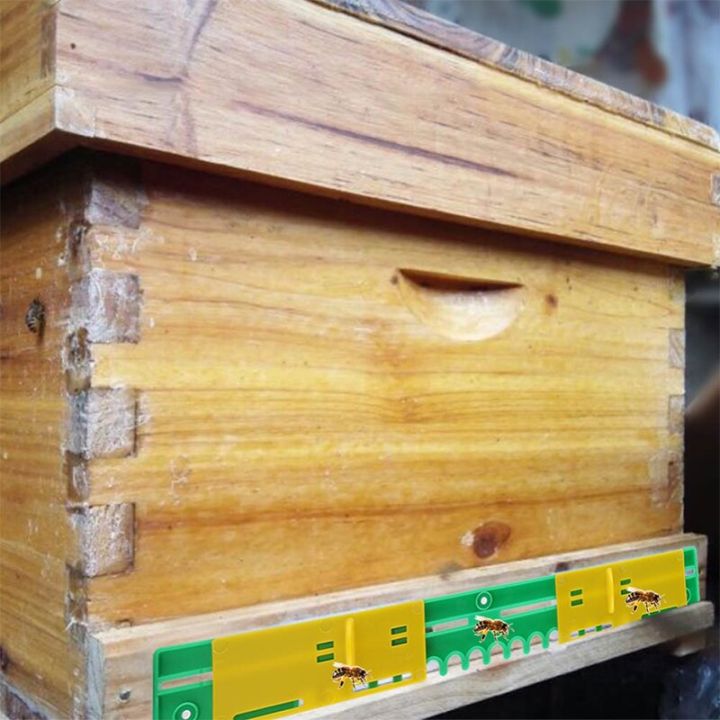 รังรังผึ้งพลาสติก1ชิ้นอุปกรณ์สำหรับเลี้ยงผึ้งประตูทางเข้ากันทางหนี