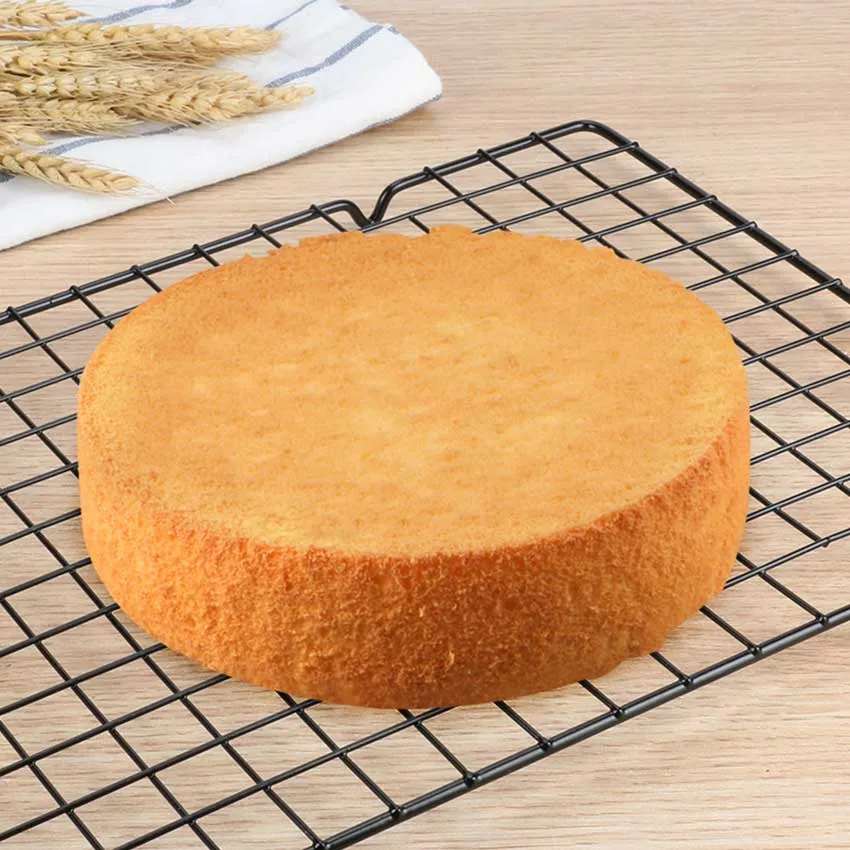 Baked Chiffon Cake On A Cooling Rack Stock Photo, Picture and Royalty Free  Image. Image 38226279.