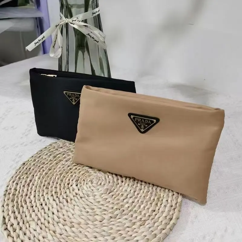 New Prada Clutch Bag Triangle P Letter Washing Bag Cosmetic Bag Storage Bag  Waterproof, Simple and Stylish, Large Capacity and Hand In Hand with The Bag.  