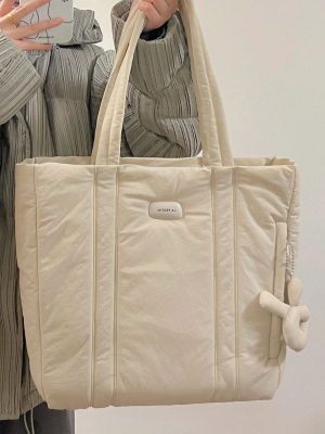 ♈ Autumn and winter womens large-capacity cotton-filled down tote bag 2023 new style simple ins soft armpit shoulder bag