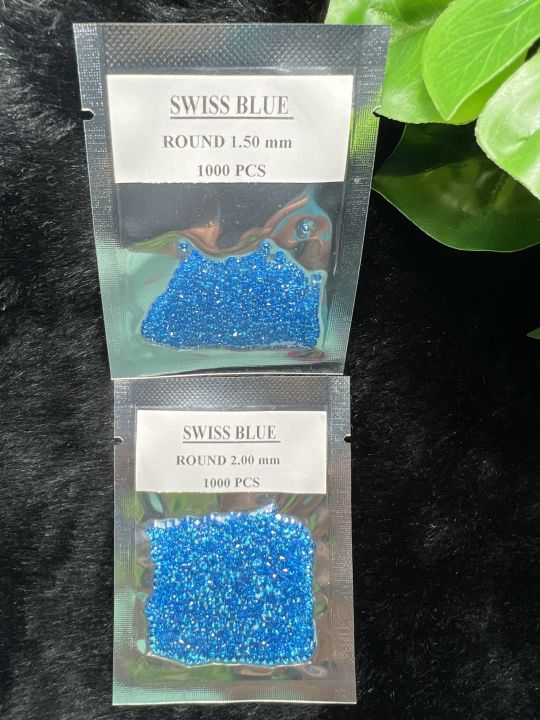 พลอย-บลูโทพาซ-สี-swiss-blue-topaz-ขายยกกล่อง-round-shape-1-50-มม-mm-1000-เม็ด-pieces-พลอยสั่งเคราะเนื้อแข็ง