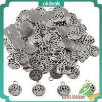 OKDEALS 100Pcs โลหะผสมอัลลอยด์ จี้รูปอุ้งเท้าหมี รูปร่างอุ้งเท้าหมี 0.71x 0.58นิ้ว เครื่องรางดีไอวาย อุปกรณ์เสริมที่มีประโยชน์ เครื่องรางโลหะกลวงขนาดเล็ก สาวๆ