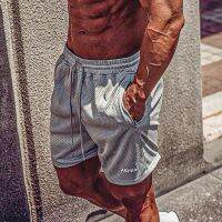 MCPW muscle quick-drying shorts male brother summer running loose trousers rolled iron squats fitness training